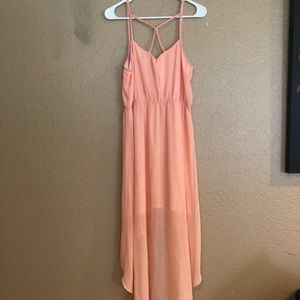 Peach high low dress.